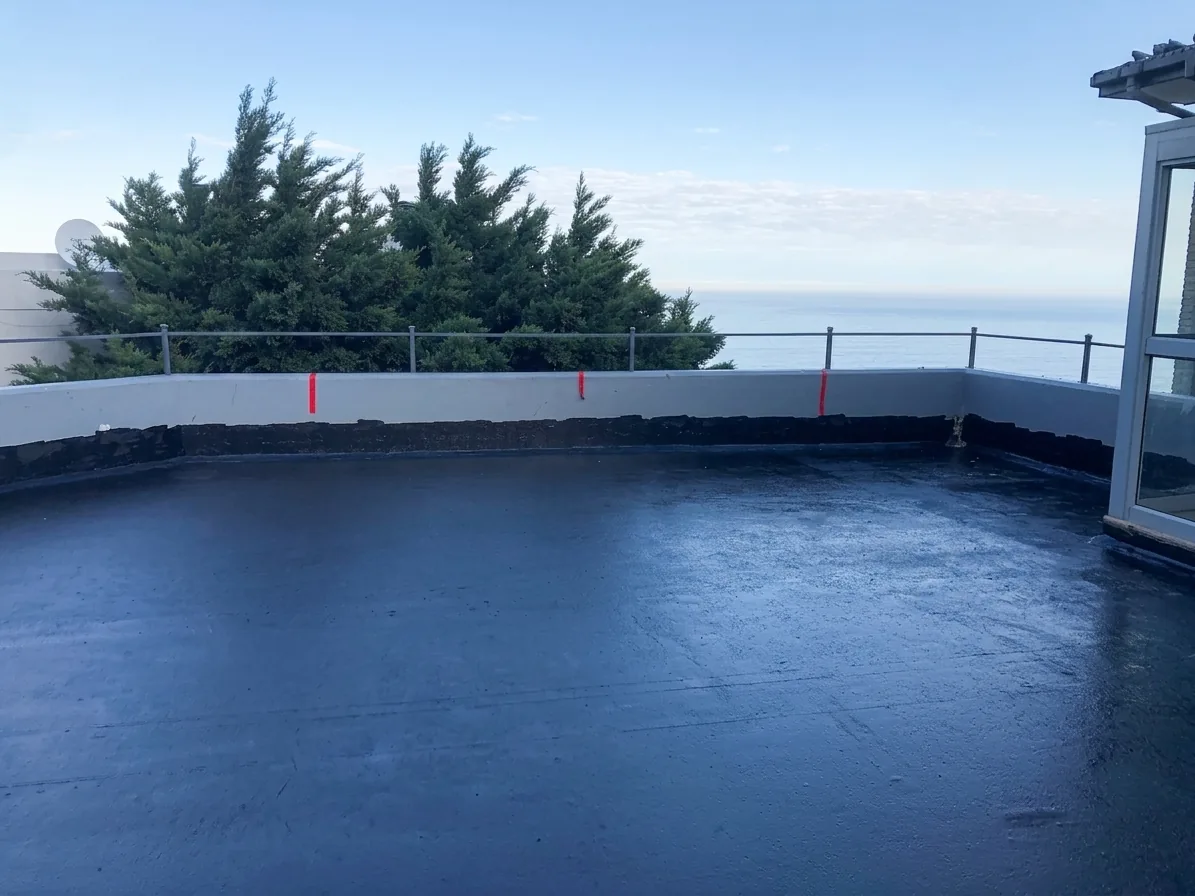 Completed waterproofed parking deck overlooking the sea in Camps Bay