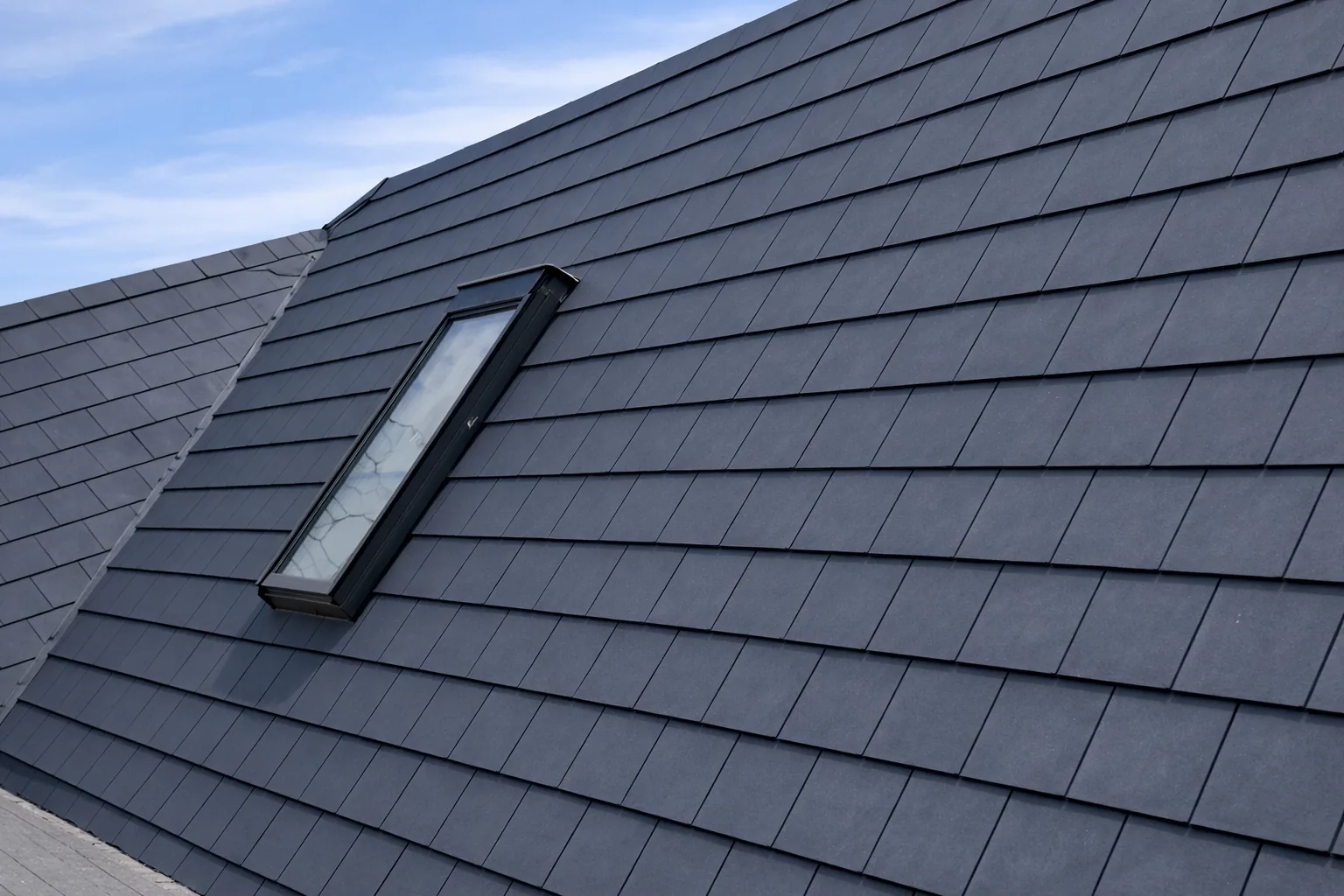Re-coated slate roof with skylight on a Camps Bay home