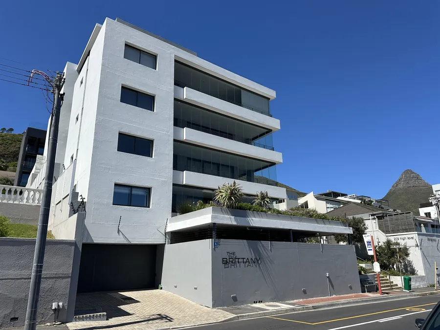 Exterior repaint of a block of flats on High Level Road, Sea Point, cracks repaired and ledges waterproofed