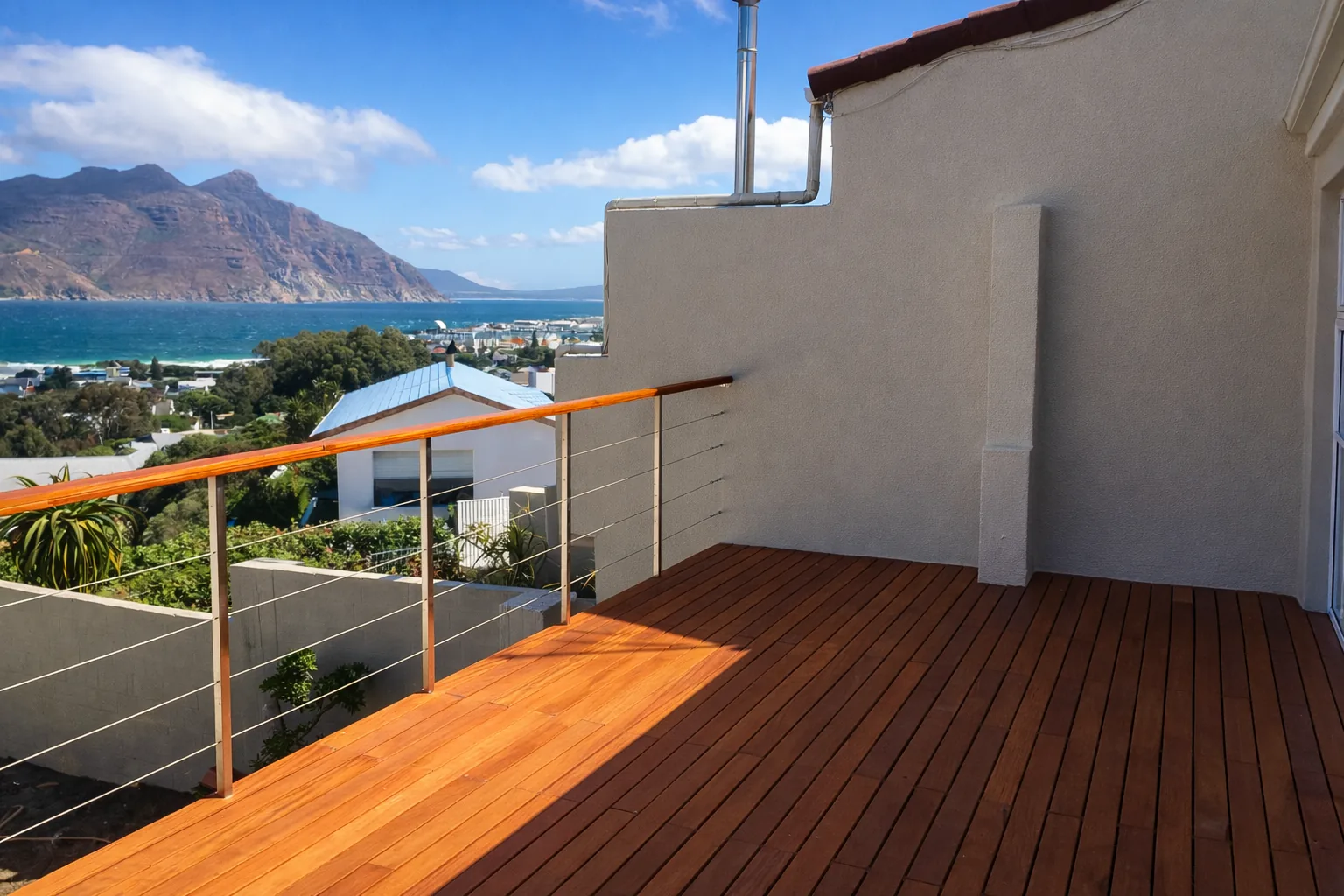 Timber deck and cable balustrade after renovation in Hout Bay