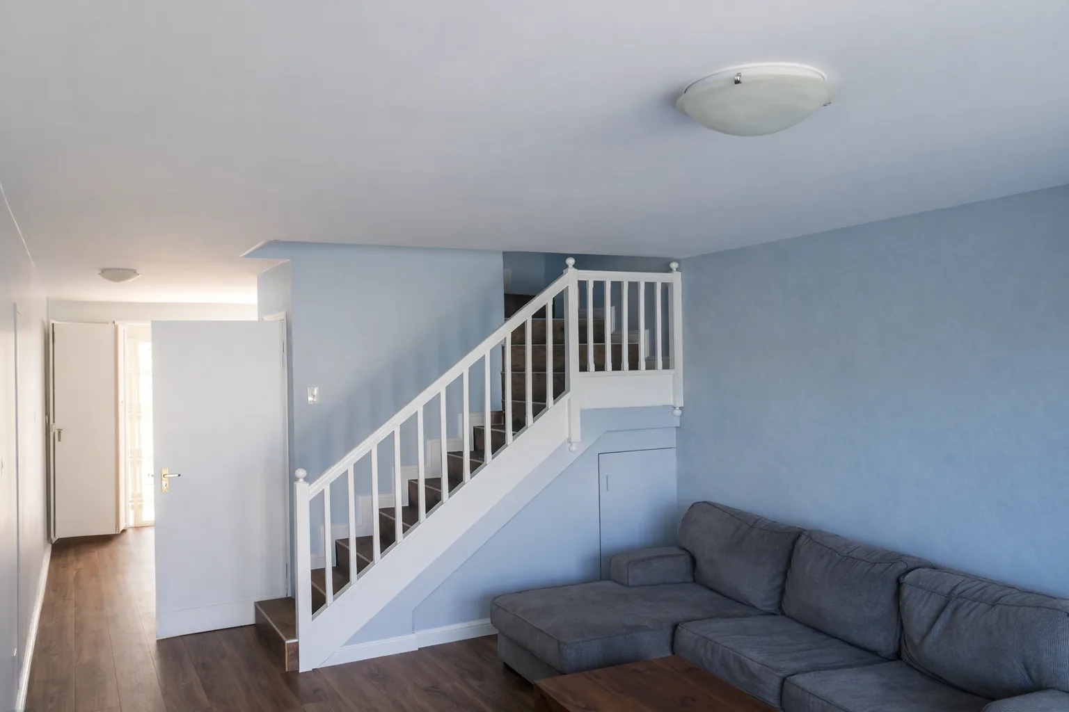 Finished interior living area and staircase after the Hout Bay renovation