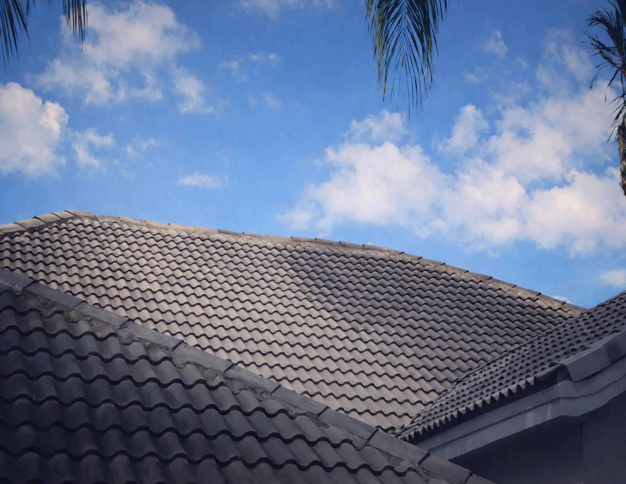Tiled roof under a clear blue Cape Town sky